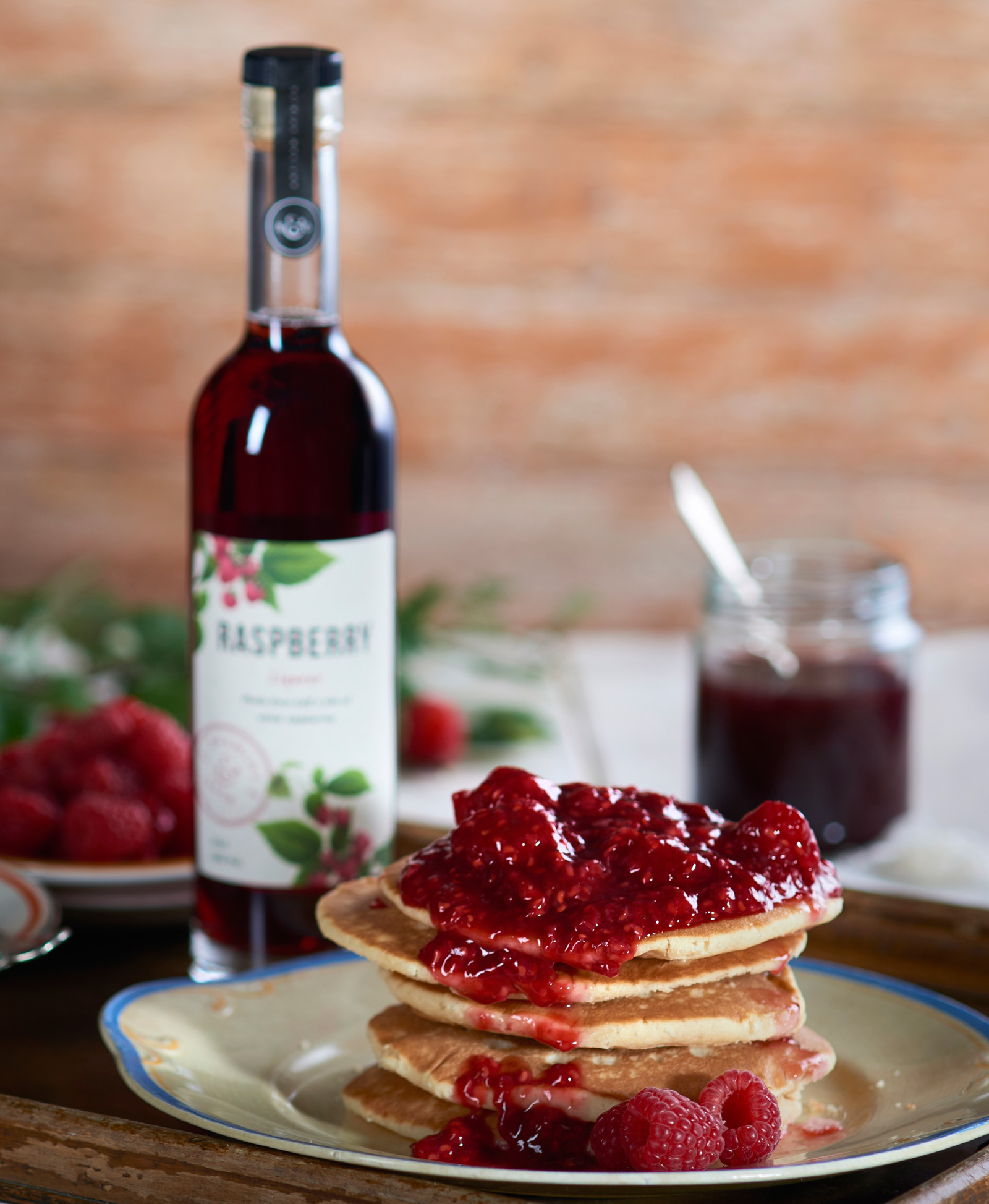 Pancakes served with a raspberry Coulis made from 6 O'Clock spirits