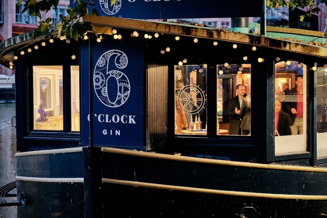 The 6 o'clock gin boat with people inside
